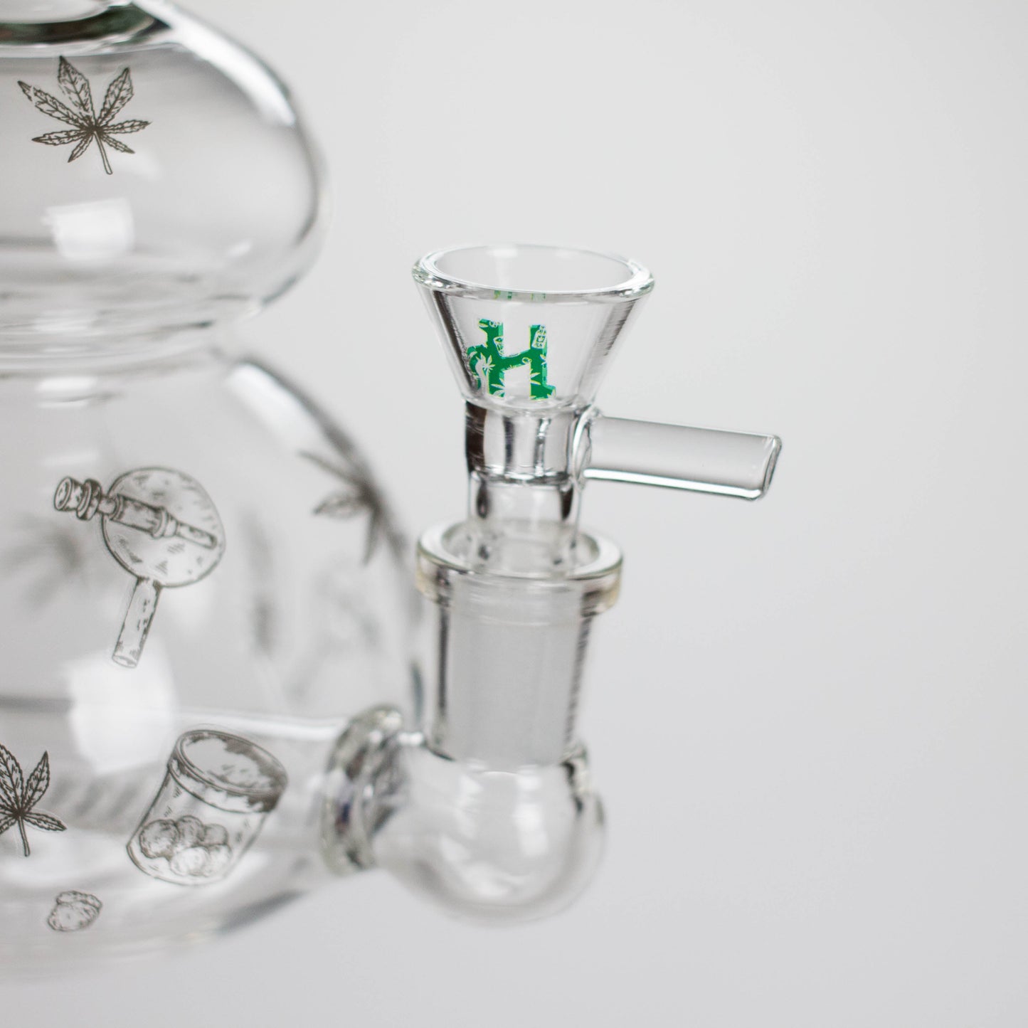 Haze | 9″ Bubble Base Glass Bong – Green Weed Leaf Design (Mini-A)